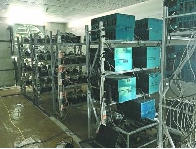 Image of a high-density mining rig setup in a professional hosting facility